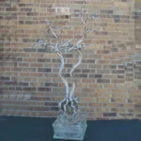 Handcrafted Gemstone Display Trees with Peridot-Rotates on Glass Brick